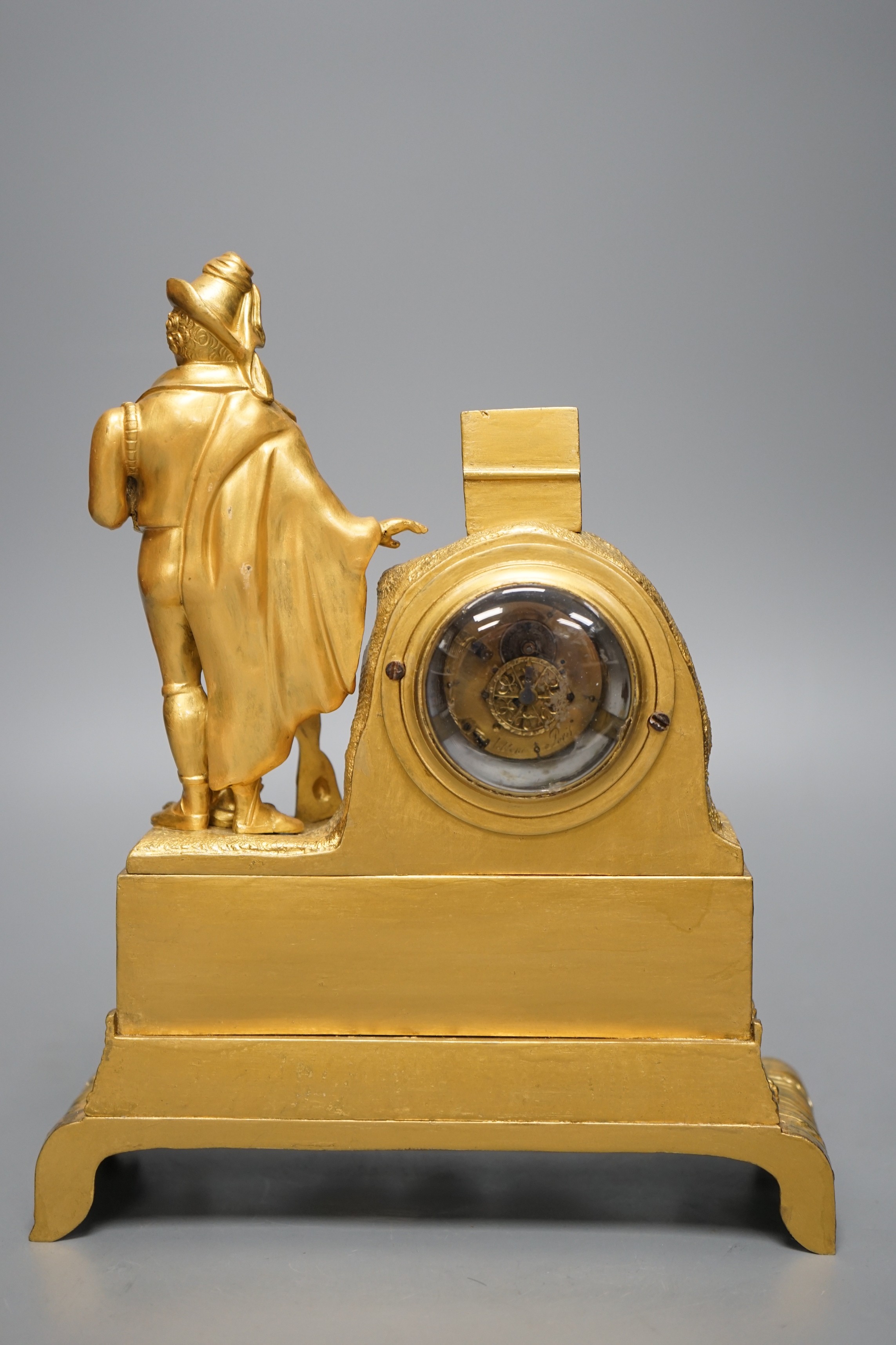 A 19th century ormolu clock with 'Huntsman' figure, 25cm tall